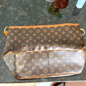 LV bag. Few ink stains . Normal wear &  aging use. view pictures clearly. 😊